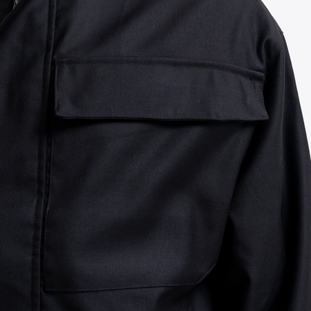 Bee Inspired Onana Jacket in Black, utility-style jacket with tonal Bee branding and chest pockets, styled shot