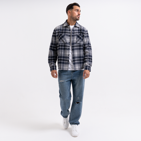 Bee Inspired Garnacho Relaxed Jeans in Mid Blue, heavyweight denim jeans with rip detailing for a worn-in look, close-up