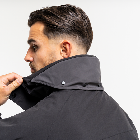 Bee Inspired Pellegrini Jacket in Black, multi-pocket jacket with a hood that packs away, styled shot
