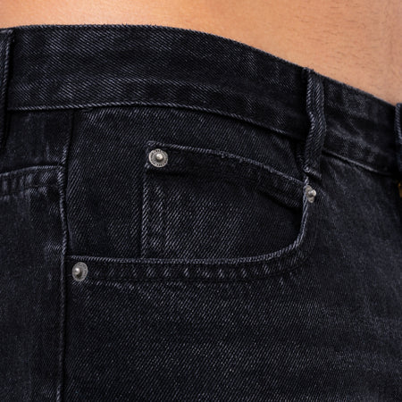 Pirlo Relaxed Jeans in black, focusing on a back waistband patch