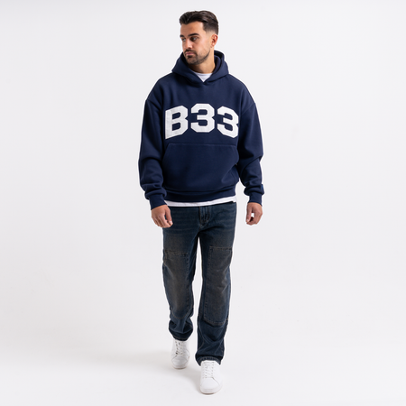 Bee Inspired Pirlo Relaxed Jeans in Indigo Wash, relaxed fit jeans with structured workwear-inspired panelling, close-up