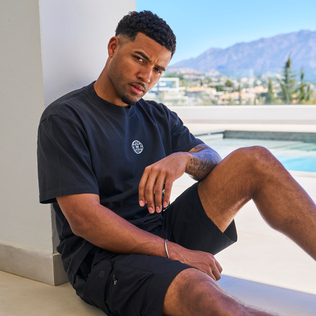 Bee Inspired Sagna Oversized T-Shirt in Faded Black, oversized graphic tee with a laid-back fit, close-up