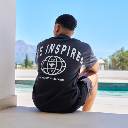 Bee Inspired Sagna Oversized T-Shirt in Faded Black, oversized graphic tee with a laid-back fit, back view