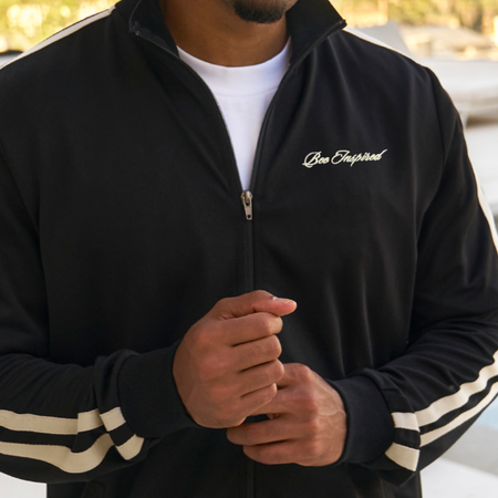 Bee Inspired Sanchez Track Top in Black, track top blending sporting heritage with modern minimalism, close-up
