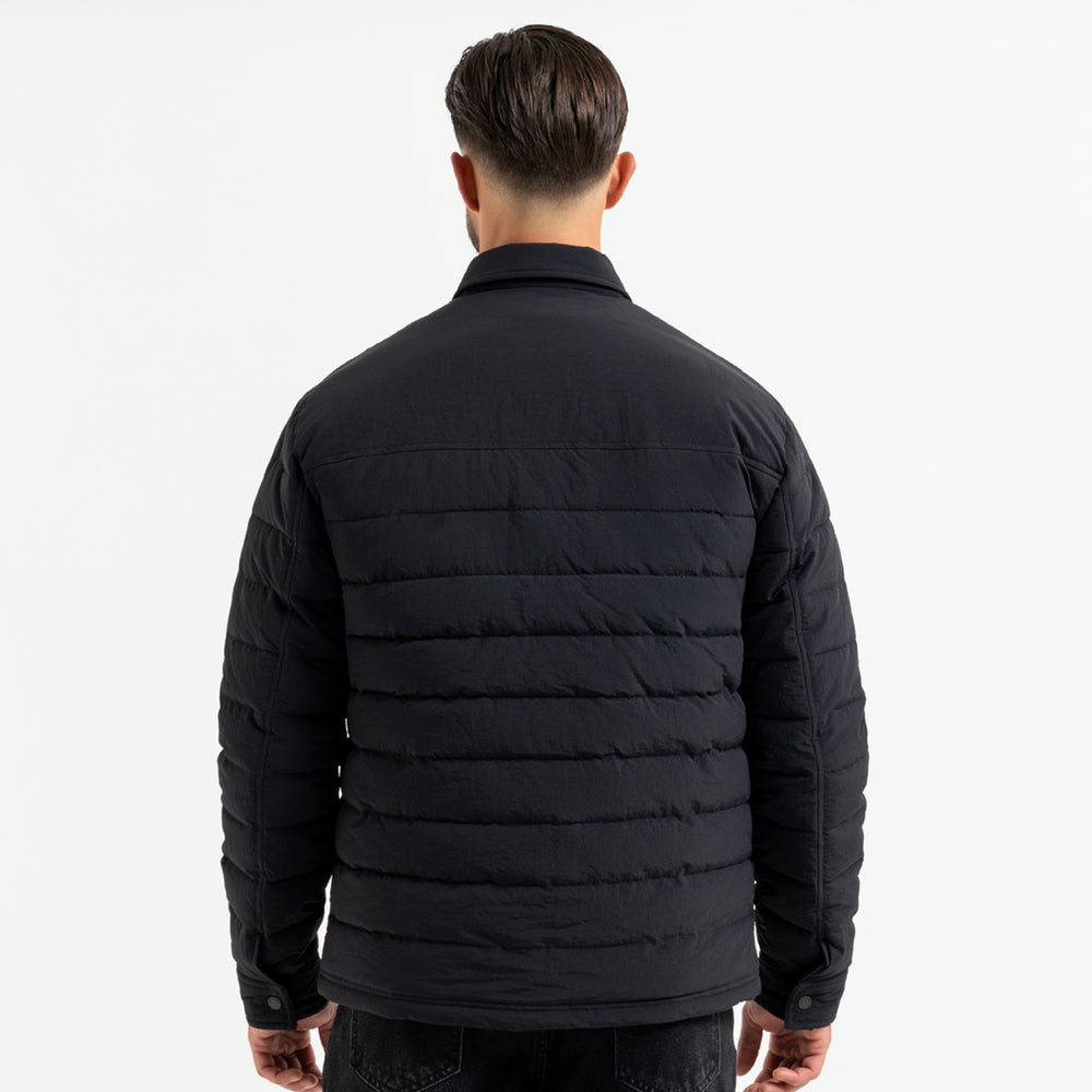 Siegrist Jacket in black with a snap fastening front