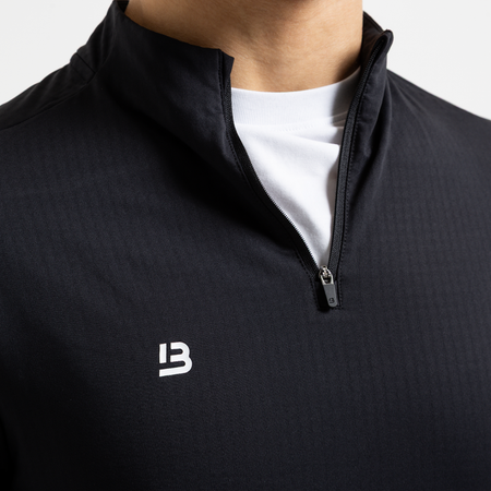 Bee Inspired Signature Sports 1/4 Zip in Black, quarter-zip sports top from the Life in Motion active range, back view