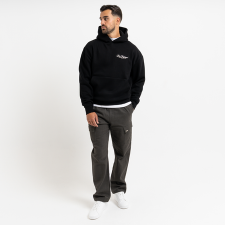Bee Inspired Team Hoodie in Black, hoodie in soft fleece fabric with embroidered and printed graphics, close-up