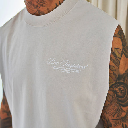 Bee Inspired Team Vest in Faded Bone, heavyweight cotton vest with raw armhole detailing, back view