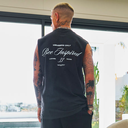 Bee Inspired Team Vest in Faded Black, heavyweight cotton vest with raw armhole detailing, front view