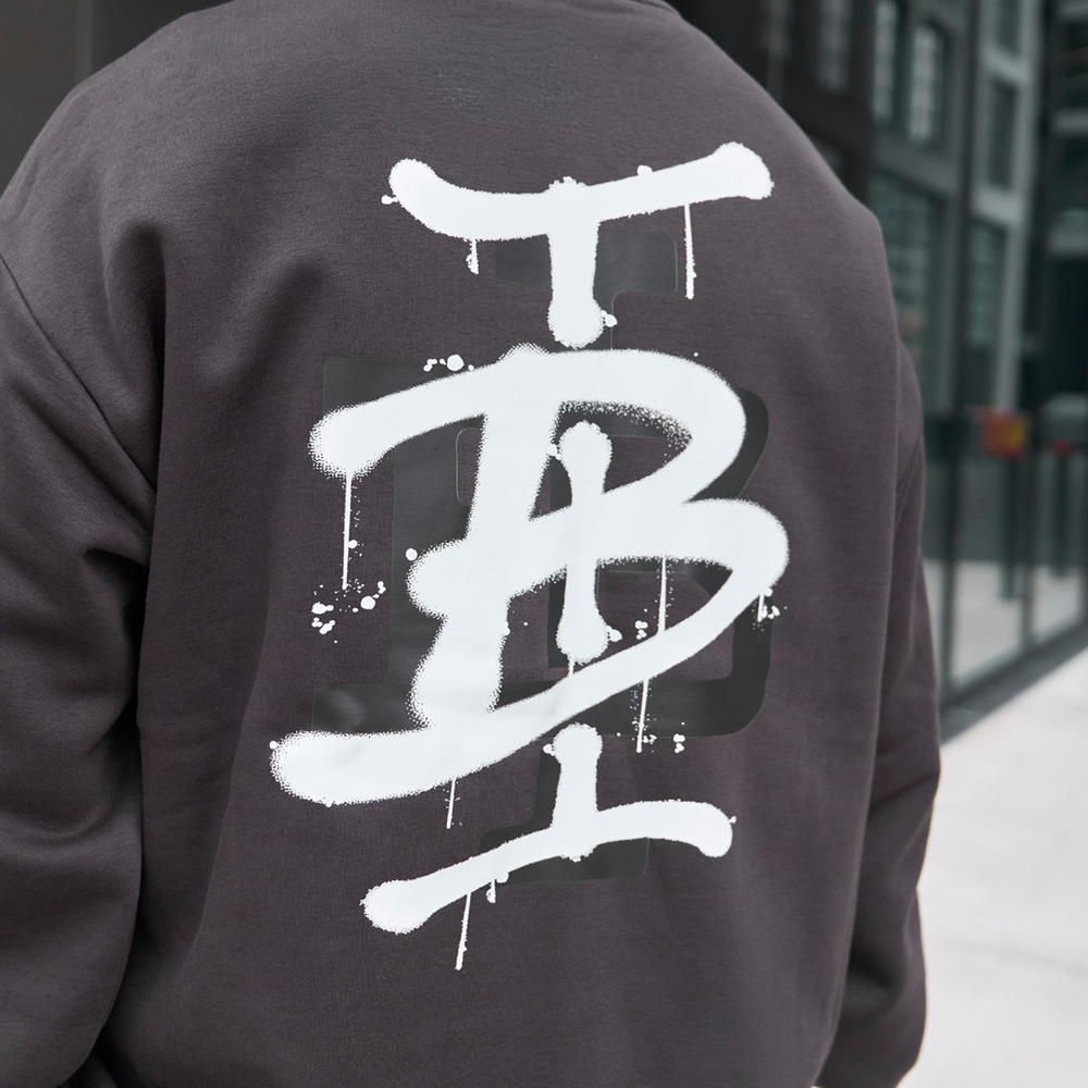 Bee Inspired Tonali Crew in Coal, close-up of large graffiti-style back graphic detail