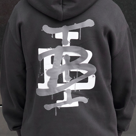 Bee Inspired Tonali Hoodie in Black, close-up of large graffiti-style back graphic detail