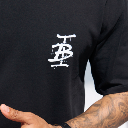 Bee Inspired Tonali Oversized T-Shirt in Black/Pink, oversized tee with a graffiti-style BI monogram print, close-up