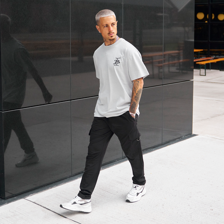 Bee Inspired Tonali Oversized T-Shirt in Faded Storm, oversized tee with a graffiti-style BI monogram print, close-up