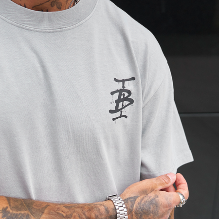 Bee Inspired Tonali Oversized T-Shirt in Faded Storm, oversized tee with a graffiti-style BI monogram print, back view