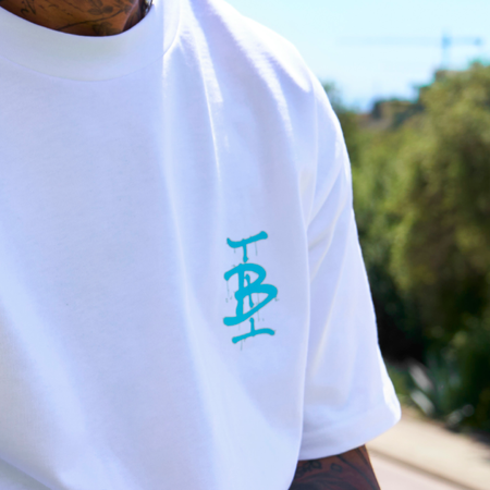 Bee Inspired Tonali Oversized T-Shirt in White/Aqua, oversized tee with a graffiti-style BI monogram print, close-up