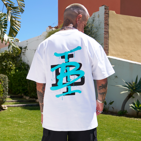 Bee Inspired Tonali Oversized T-Shirt in White/Aqua, oversized tee with a graffiti-style BI monogram print, front view