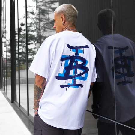 Bee Inspired Tonali Oversized T-Shirt in White/Blue, oversized tee with a graffiti-style BI monogram print, front view