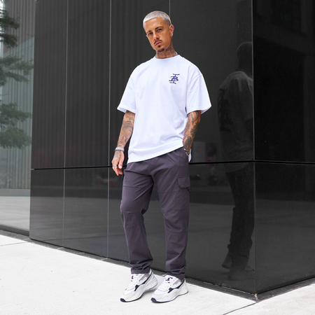 Bee Inspired Tonali Oversized T-Shirt in White/Blue, oversized tee with a graffiti-style BI monogram print, close-up