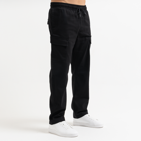 Bee Inspired Verdi Cargo Pant in Black, relaxed fit carpenter-style cargo trousers with a drawcord waistband, back view