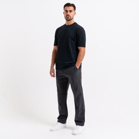 Bee Inspired Zamorano Cord Pant in Charcoal, cord trousers with a soft hand-feel and embroidered script branding, close-up